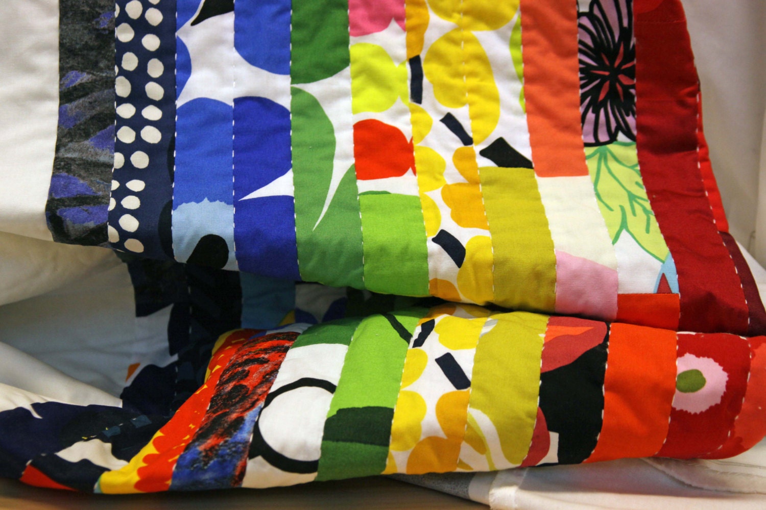 Modern quilt made from Marimekko fabric patchwork geometric