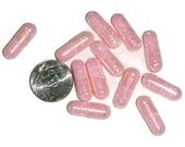 Powder pink glitter caps, baby pink glitter pills, pink glitter bombs