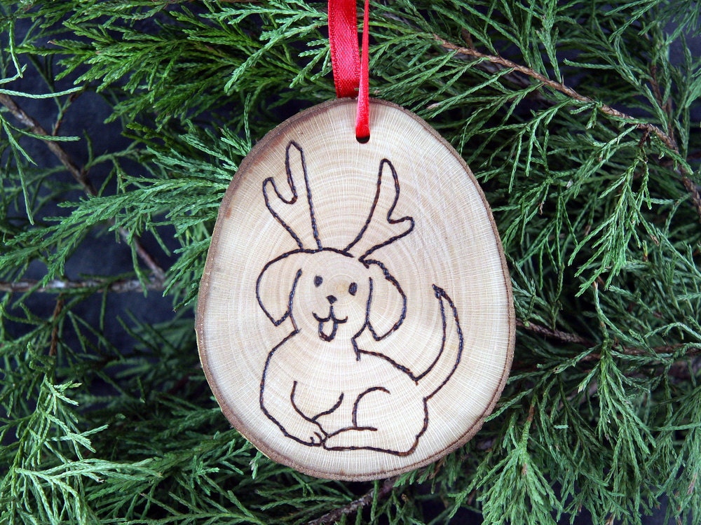 Handmade Reindeer dog wooden ornament.