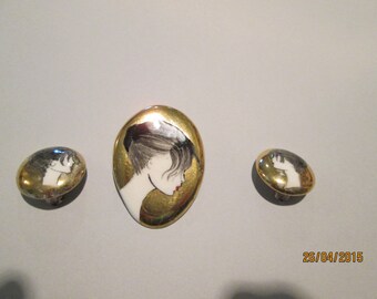 painted and gilt ceramic brooch and earclips 1960s