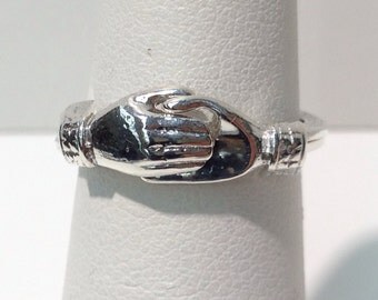 Holding Hands Ring Handmade in Sterling Silver
