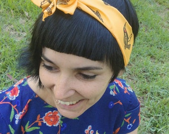 Huia birds pure silk scarf, featuring male and female birds printed in black ink by hand