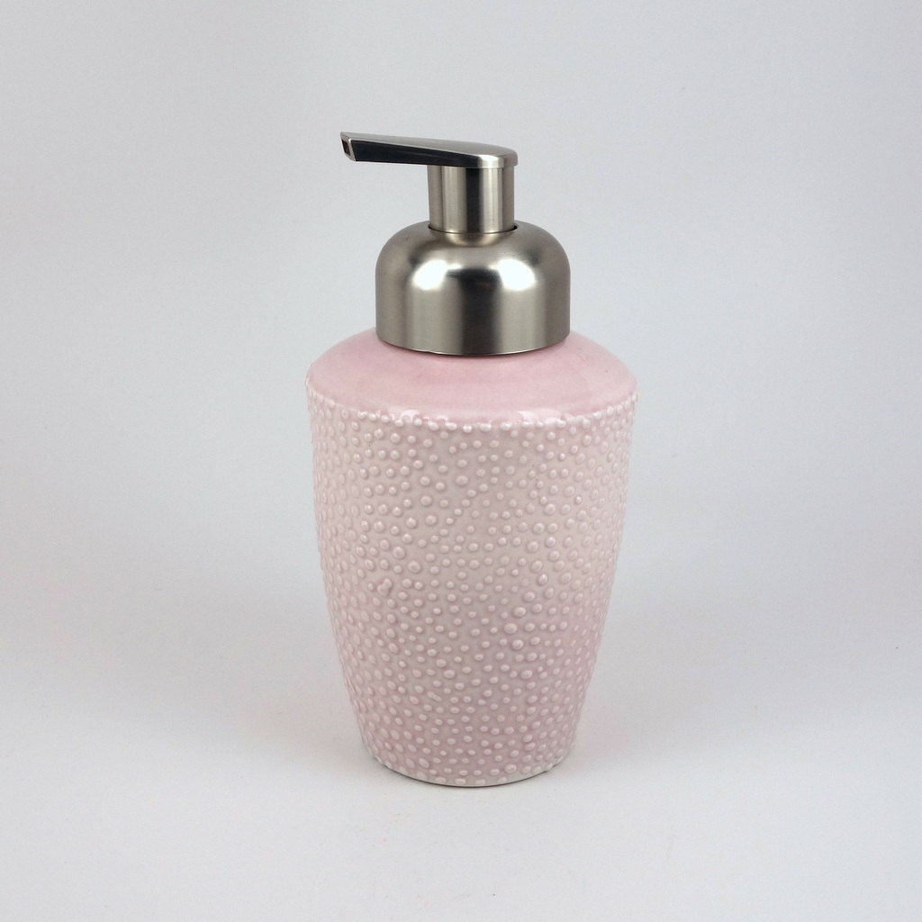 Lavender pink foam soap dispenser with slip trailed dot