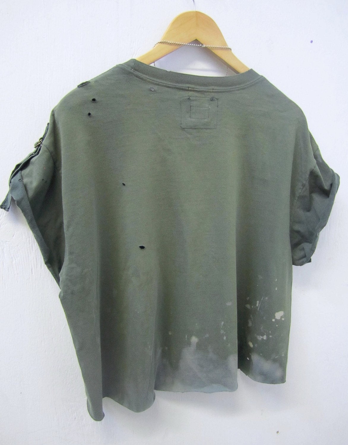 green distressed shirt