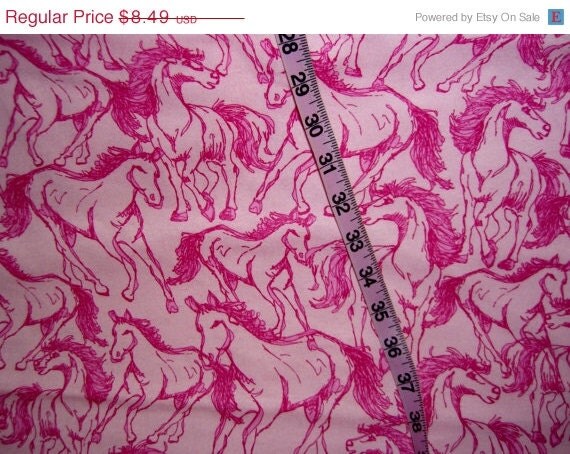 Flannel fabric with horses horse on pink by ConniesQuiltFabrics