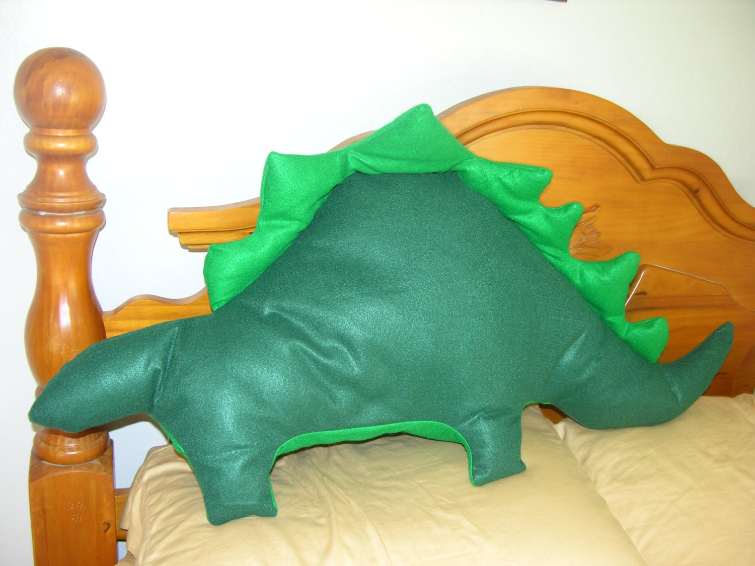 dinosaur shaped pillow