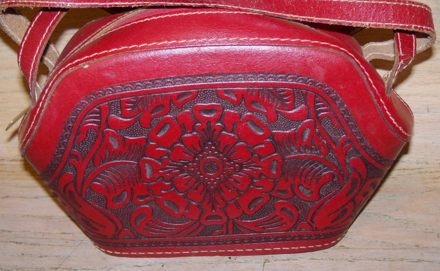 red tooled leather purse