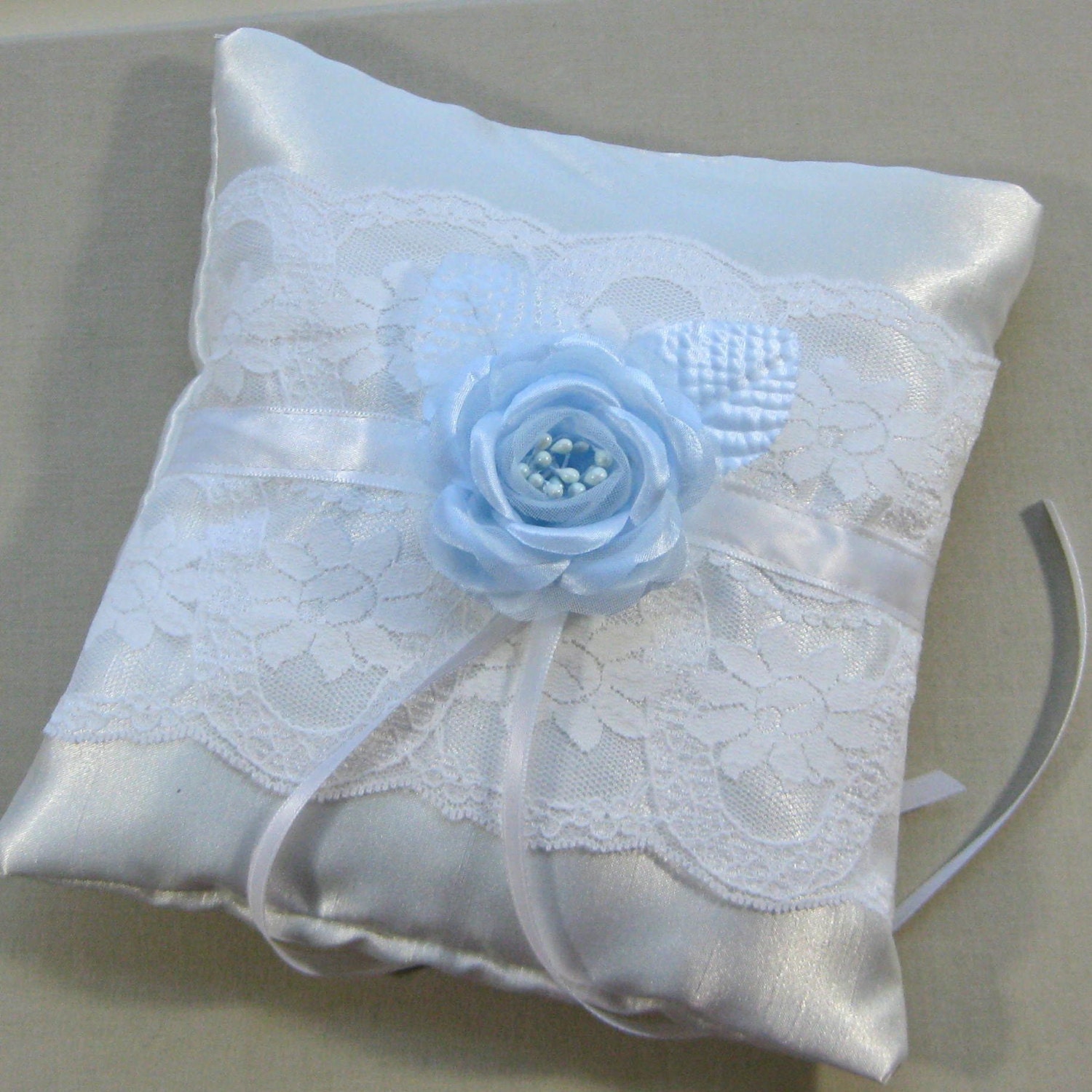 White Satin and Lace Ring Bearer Pillow with Blue Rose