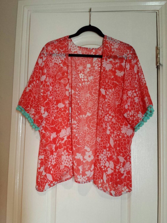 Tangerine Floral Print Kimono with Pom Pom by CoffeeTalkLosAngeles