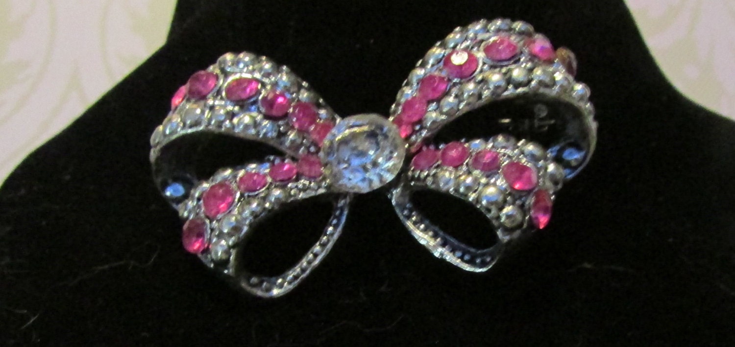 Vintage silver tone pink rhinestone bow pin brooch