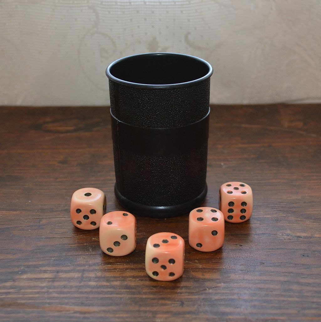 Vintage dice with cup Yahtzee