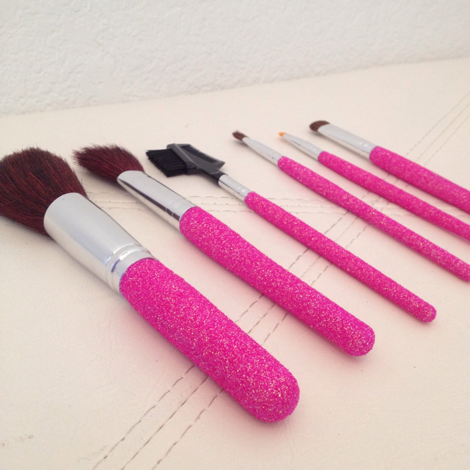 Makeup brushes with glitter