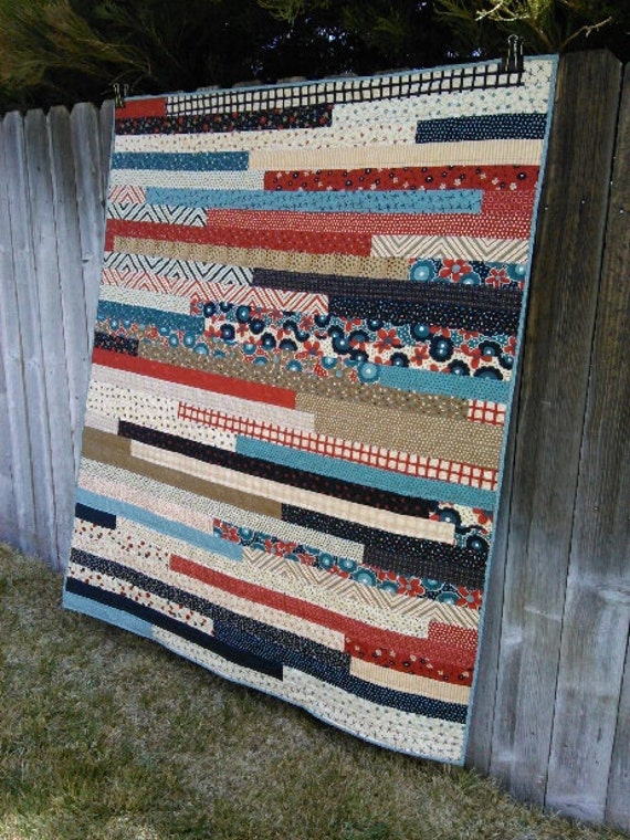 modern-patriotic-jelly-roll-quilt-in-great-colors-of-navy