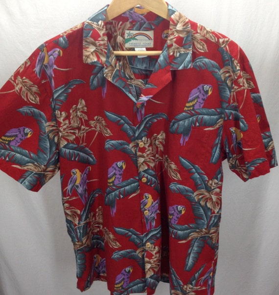 Magnum PI Paradise Found Hawaiian shirt. Red parrot motif.
