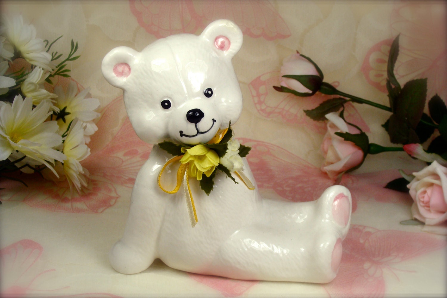 porcelain doll with teddy bear