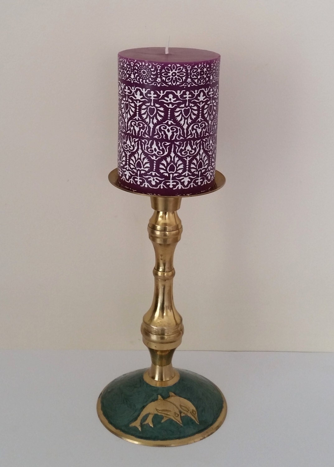 Vintage brass and green enamel candle holder with dolphins