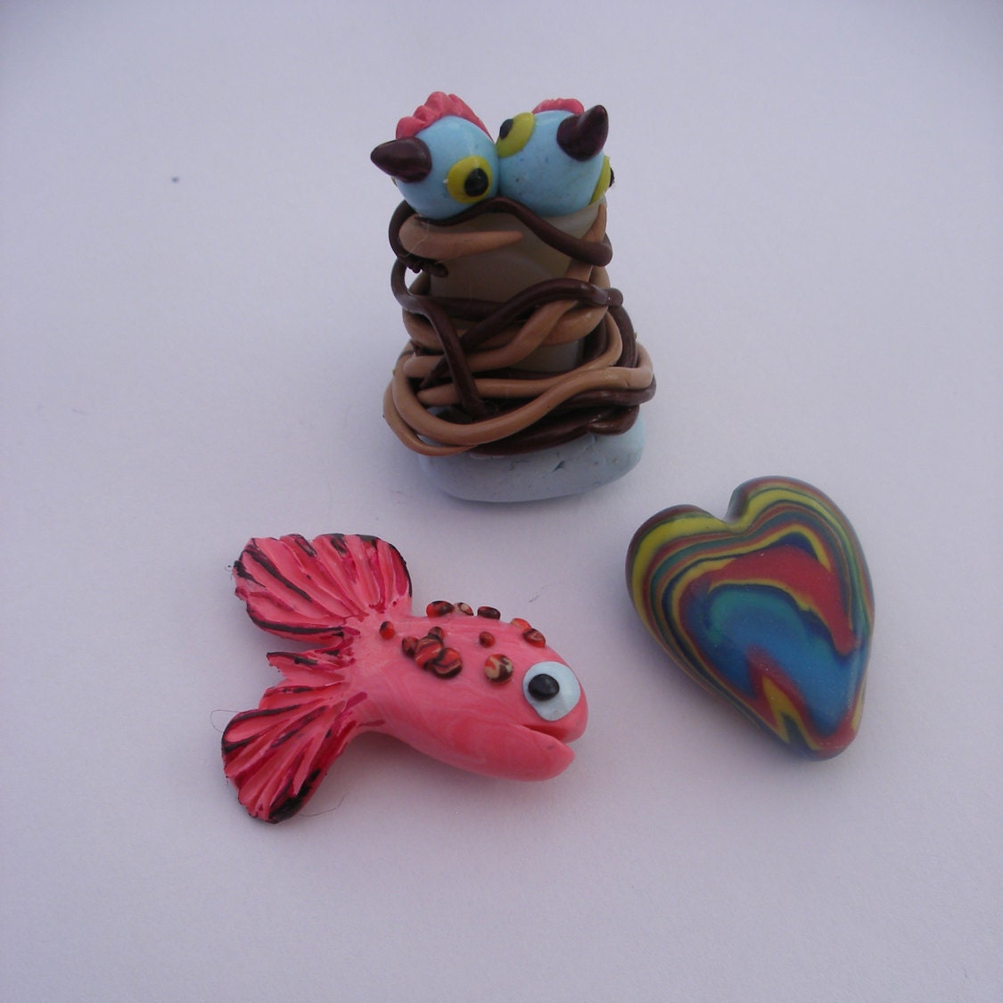 pocket charms lucky charms fish birdies by LiloLilsEmporium