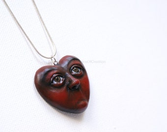 Original art as heart pendant: Love Is Silence!!! Dark red hand sculpted and hand painted portrait sculpture heart as art jewelry for her.