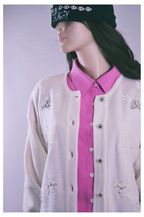 cream cardigan with pearls