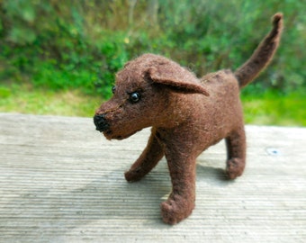 small brown stuffed dog