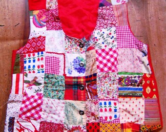 Jacket in patchwork to predominantly red. (size 40/42)