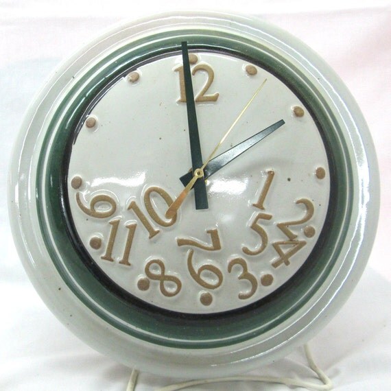 Items similar to WALL CLOCK, "Falling Numbers" Handmade Stoneware in