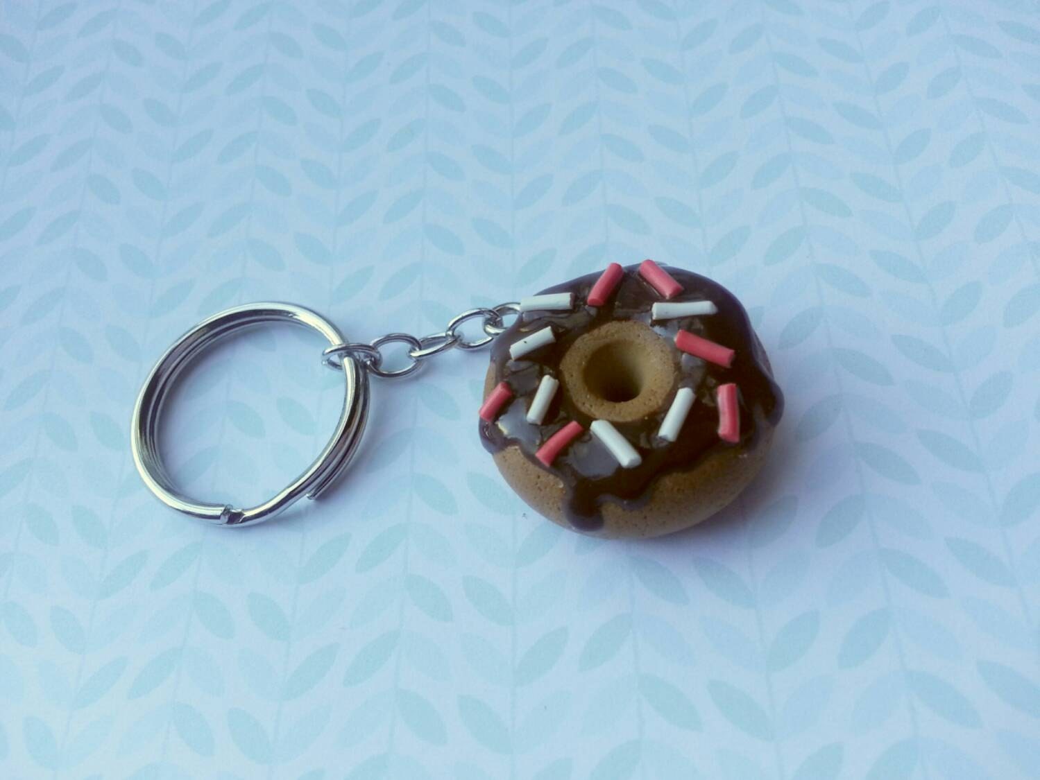 Chocolate covered polymer clay doughnut with sprinkles by Clayzie