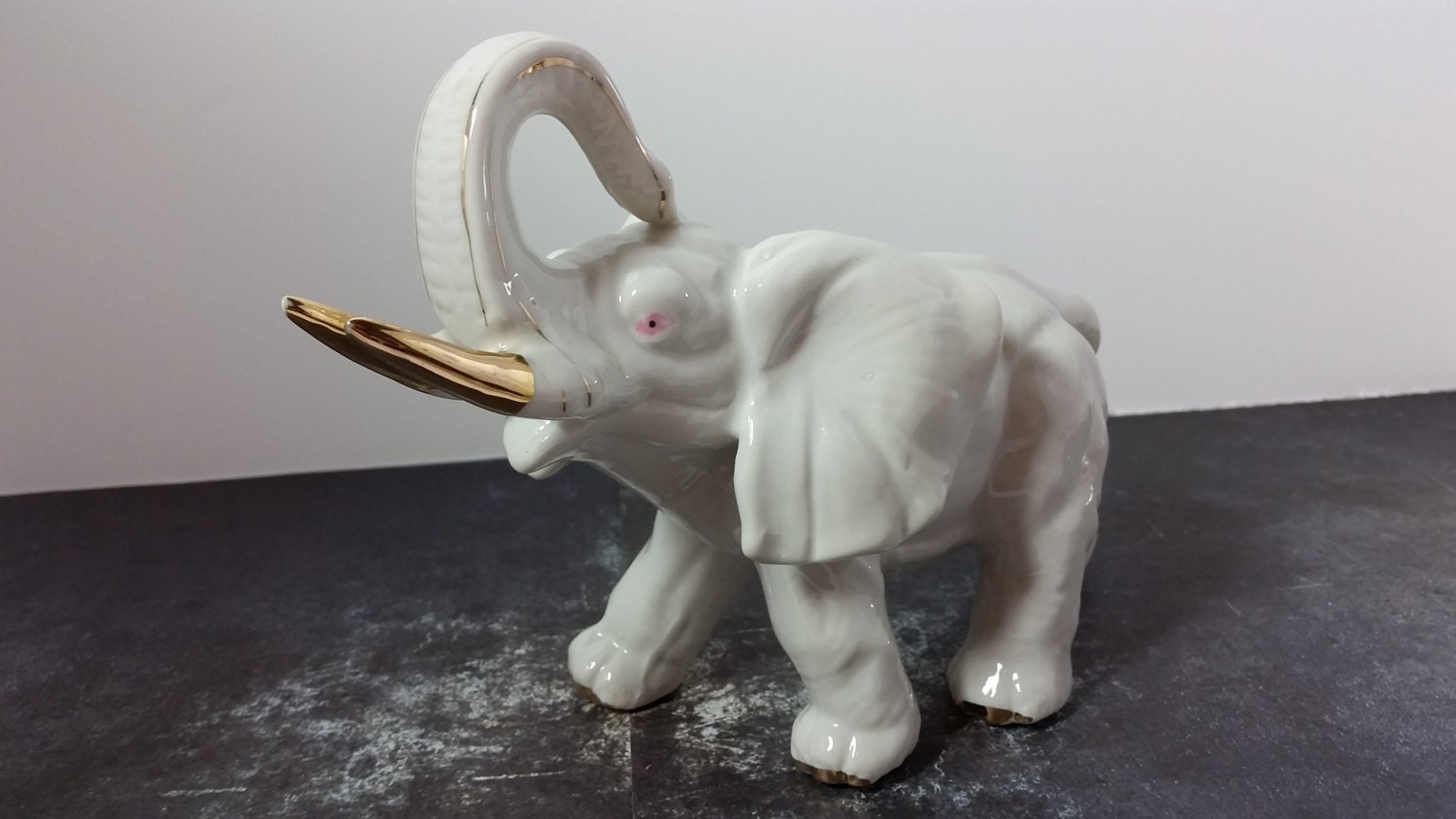 White Ceramic Elephant Figurine Gold Tusks Pink Eyes by ChicTexan