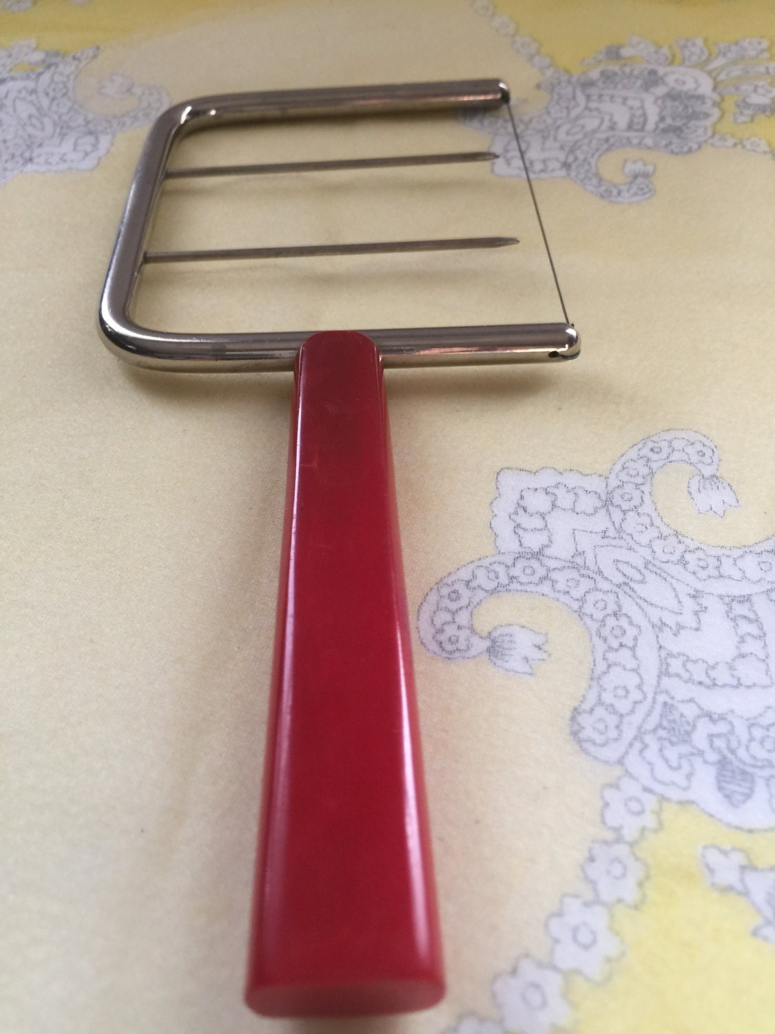 Vintage cheese slicer cutter red bakelite handle by SweetThursday