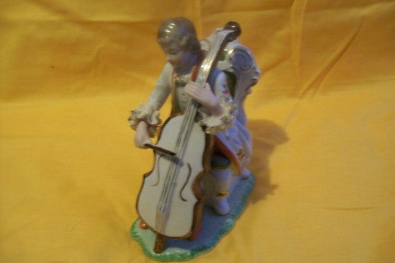 A victorian man playing an instrument, the cello, vintage, 1950's, collectible, porcelain, porcelain lace, gift, vintage gift