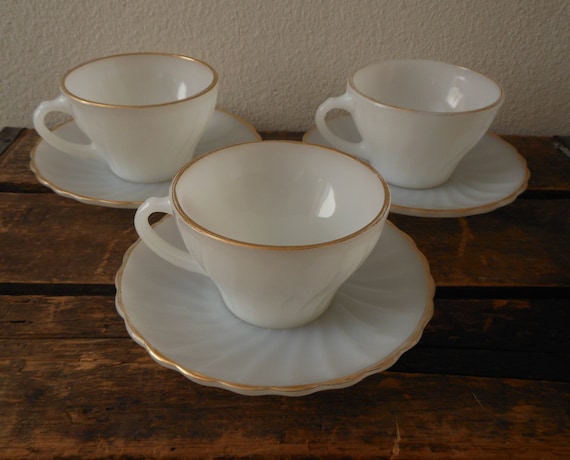 cups and vintage anchor  hocking saucers il_570xN.701826586_8y8b.jpg