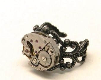 Steampunk ring with vintage watch. Steampunk jewelry.