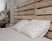 Reclaimed wooden headboard custom-made by order. Pallet headboard