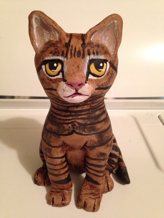 realistic cat sculpture