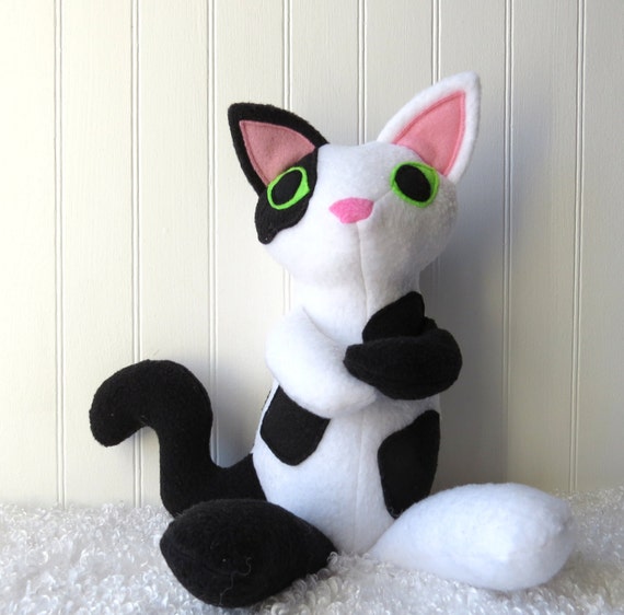 black and white stuffed animal cat