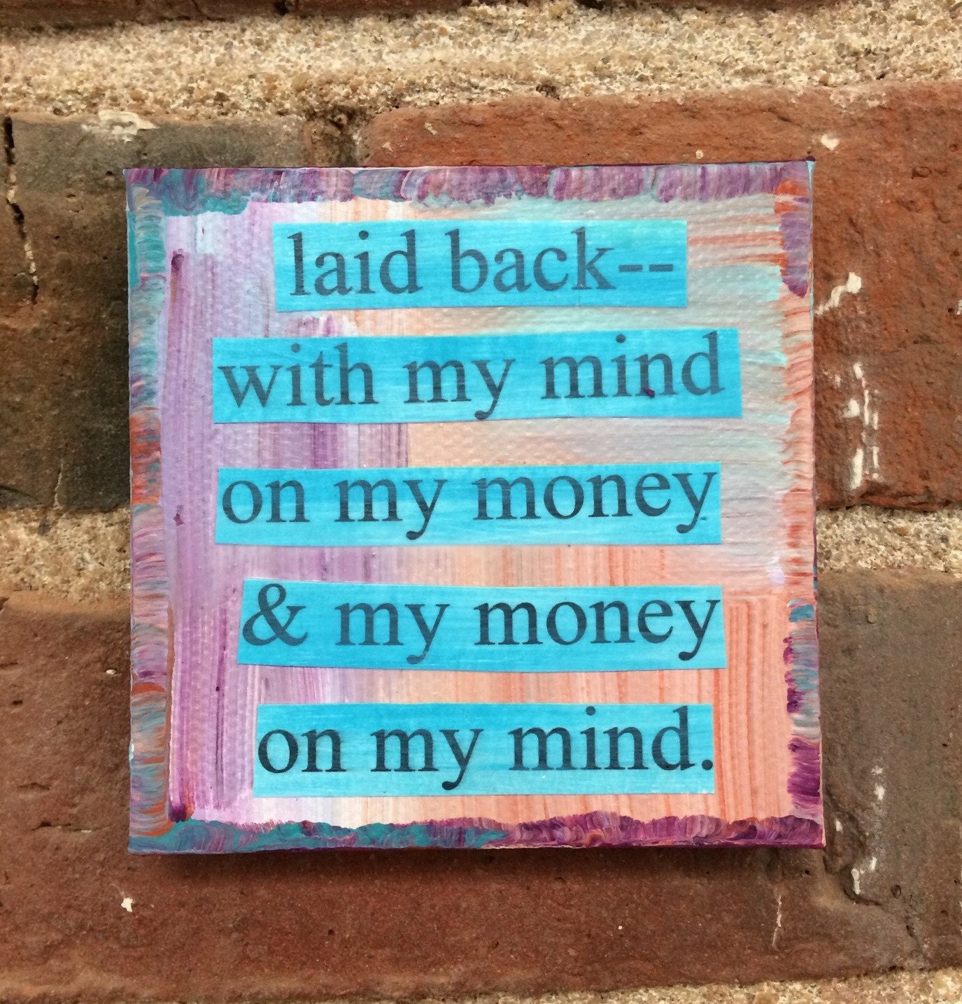 laid back with my mind on my money and my money on my mind.