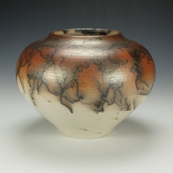 Horse Hair Raku Pottery. Terra Sigillata hand polished.