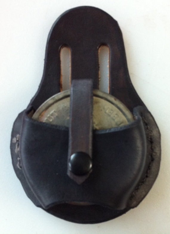 Snuff Can holder leather. Black. Hangs lower on the belt.