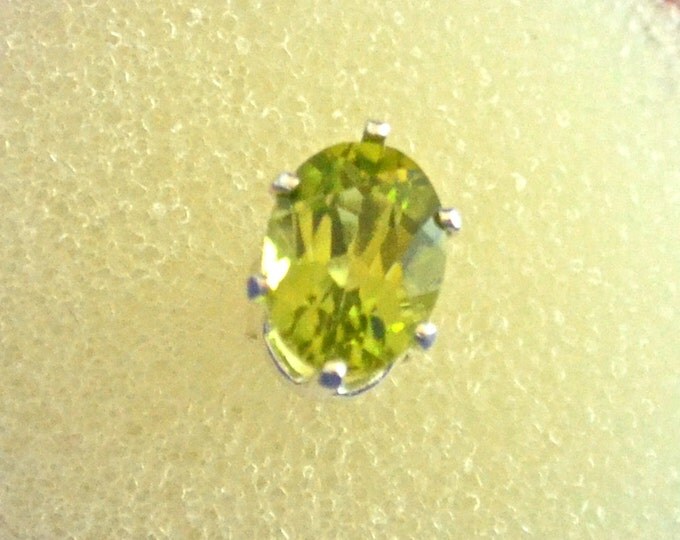 Peridot stud Earrings, 7x5mm Oval, Natural, Set in Sterling Silver E685