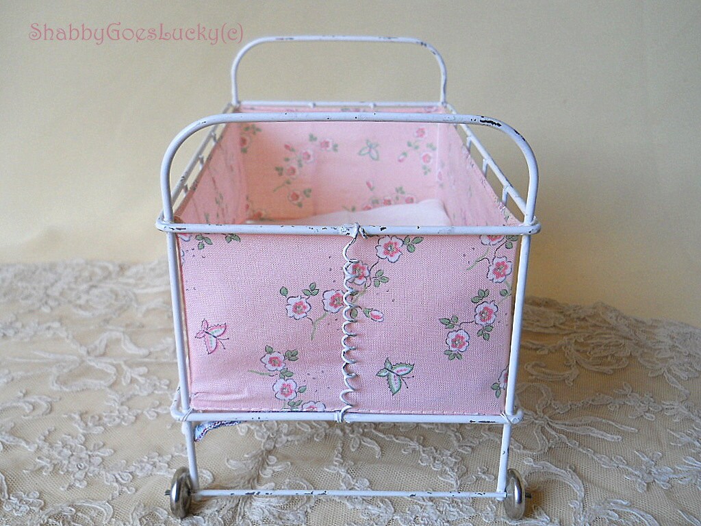 Small vintage 1950s metal doll bed on tin by ShabbyGoesLucky