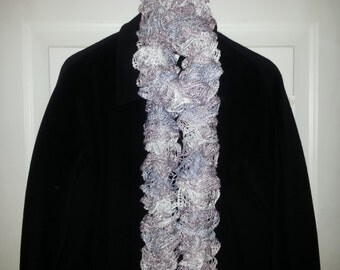 Hand Knitted Ruffle scarf made out of soft Red Heart Boutique Sashay yarn