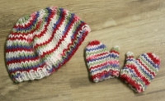 knitted beanie doll with mittens