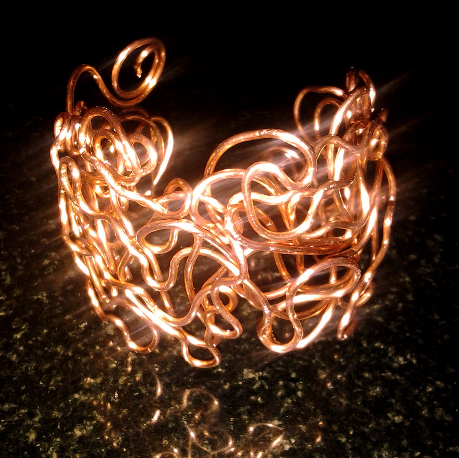 copper wire cuff bracelet made from bending copper wire