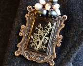 The Victorian era. Jewelry Set. Large brooch and vintage earrings.
