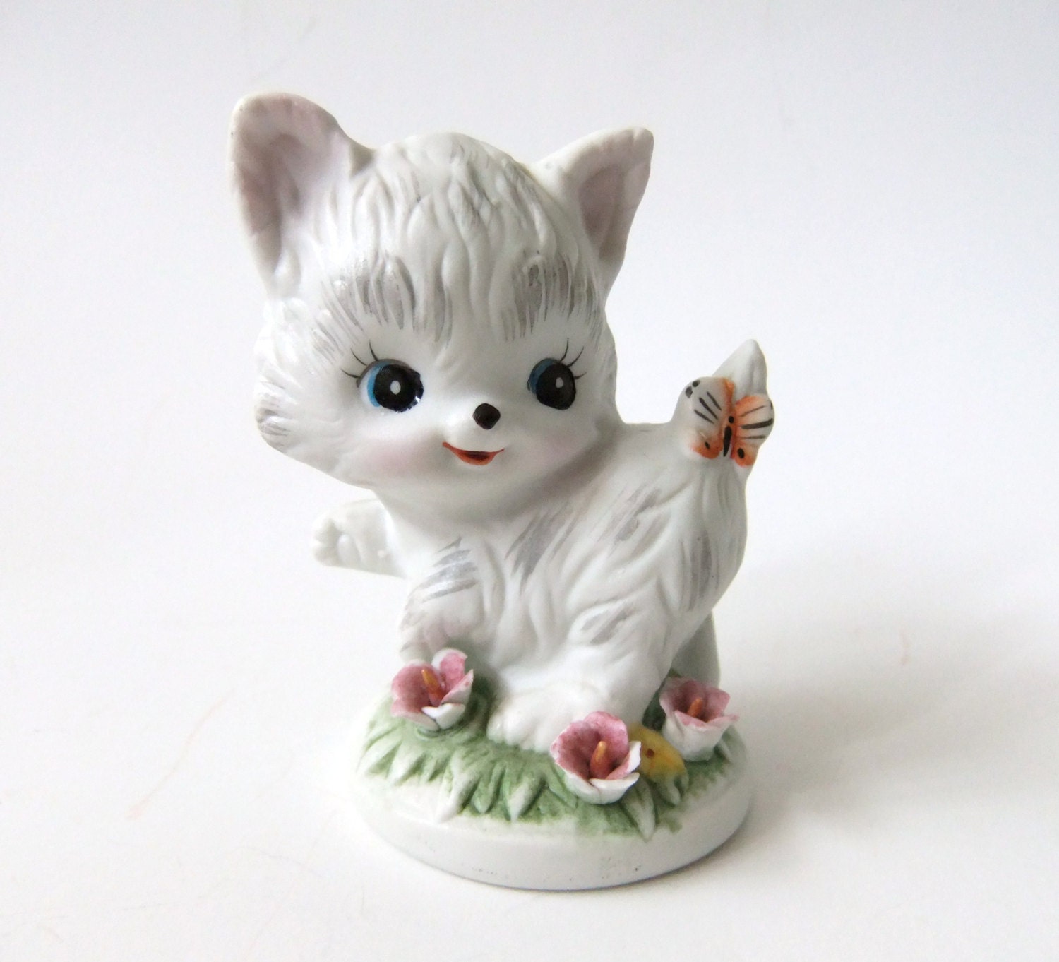 cat reading figurine