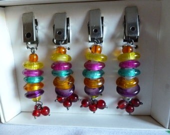 Holding tablecloth colorful beads