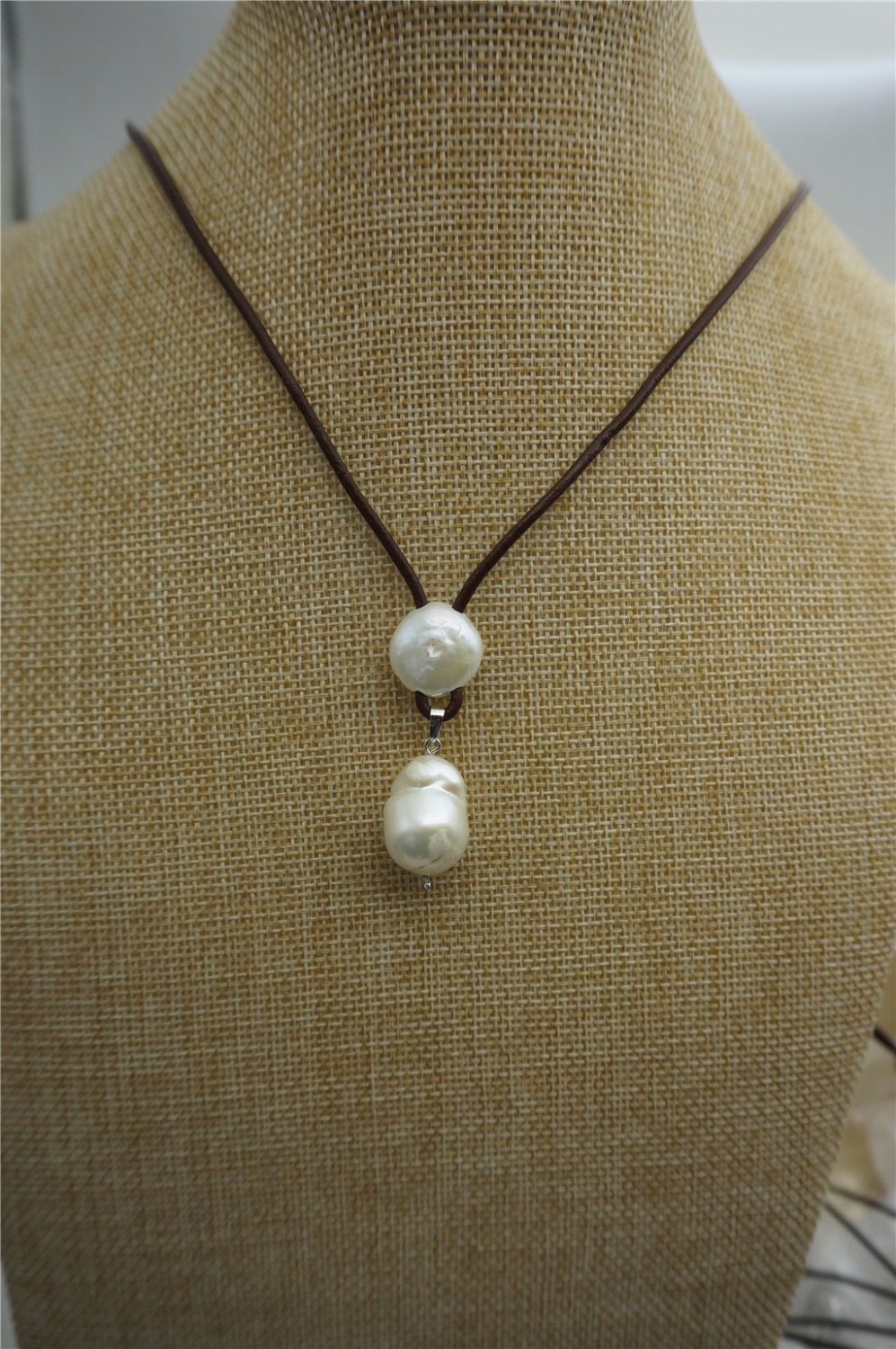 Flameball pearl and leather necklaceBaroque Freshwater Pearl