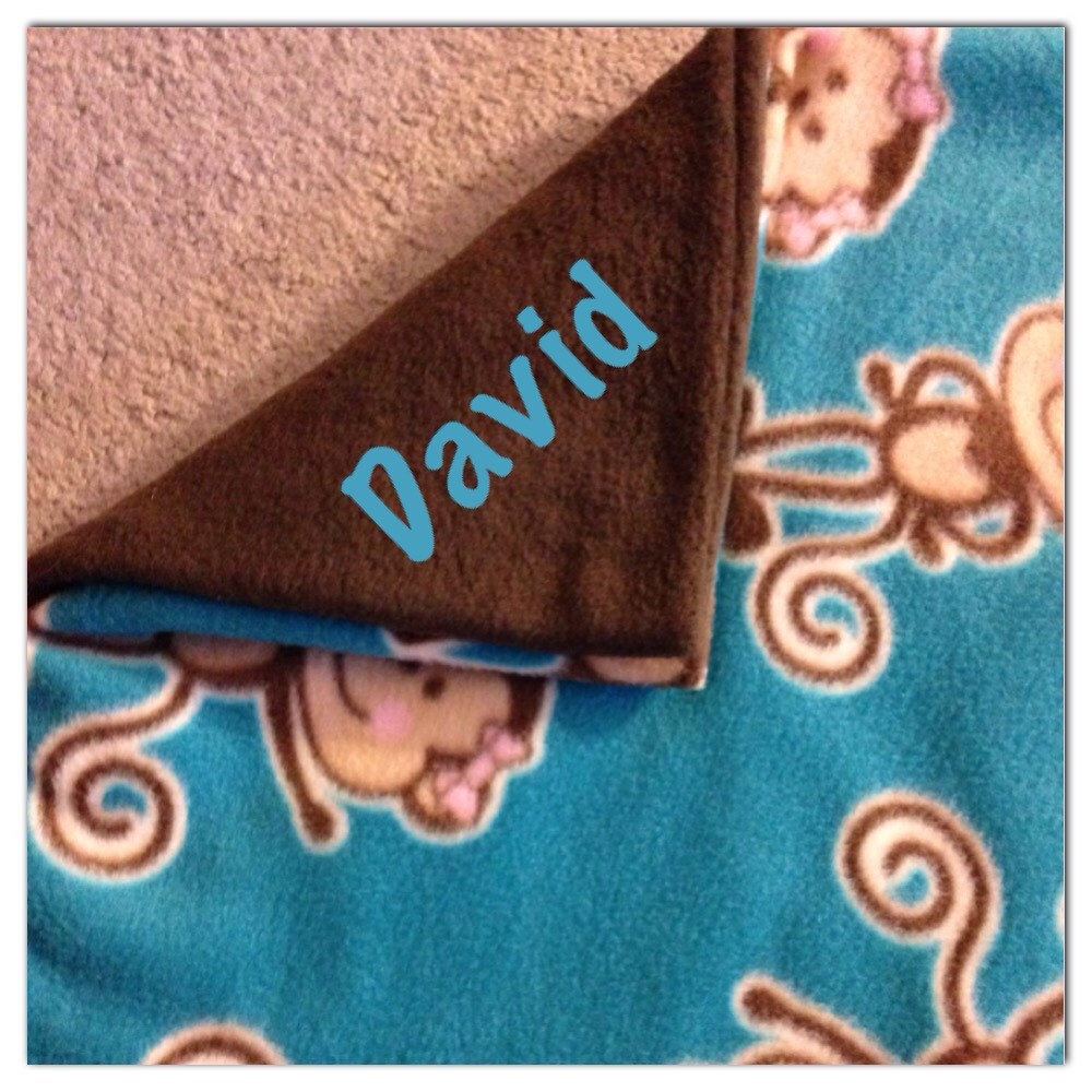 Personalize this cute monkeys double layered fleece blanket