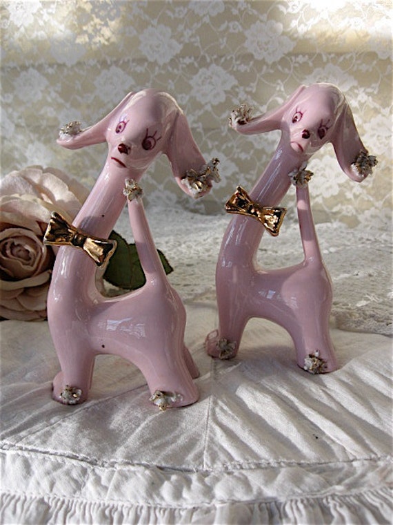 vintage pink porcelain poodles