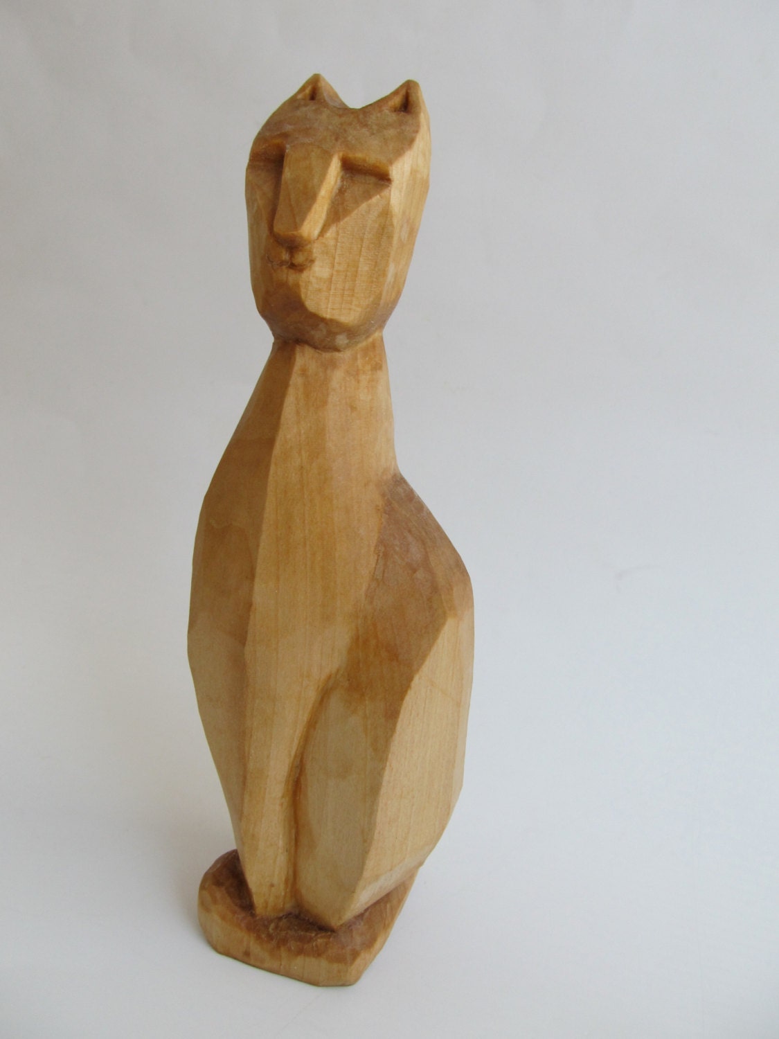 wooden cat sculpture